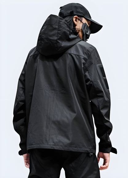 Back side view of a tactical jacket, emphasizing its streamlined silhouette and strategically placed pockets, suitable for outdoor adventures and everyday wear in the UK.