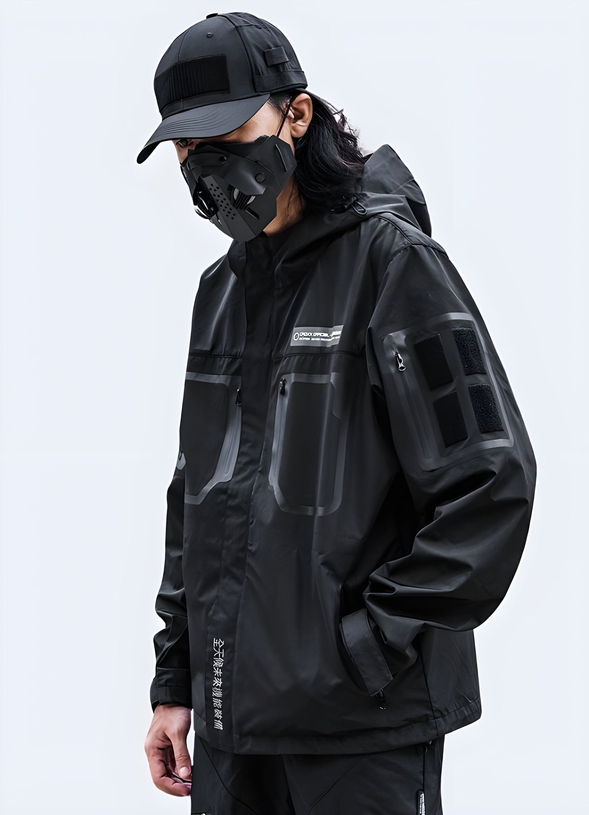  Left side view of a model wearing a tactical jacket, highlighting its ergonomic design and advanced materials, ideal for UK consumers seeking a reliable and versatile outerwear solution.