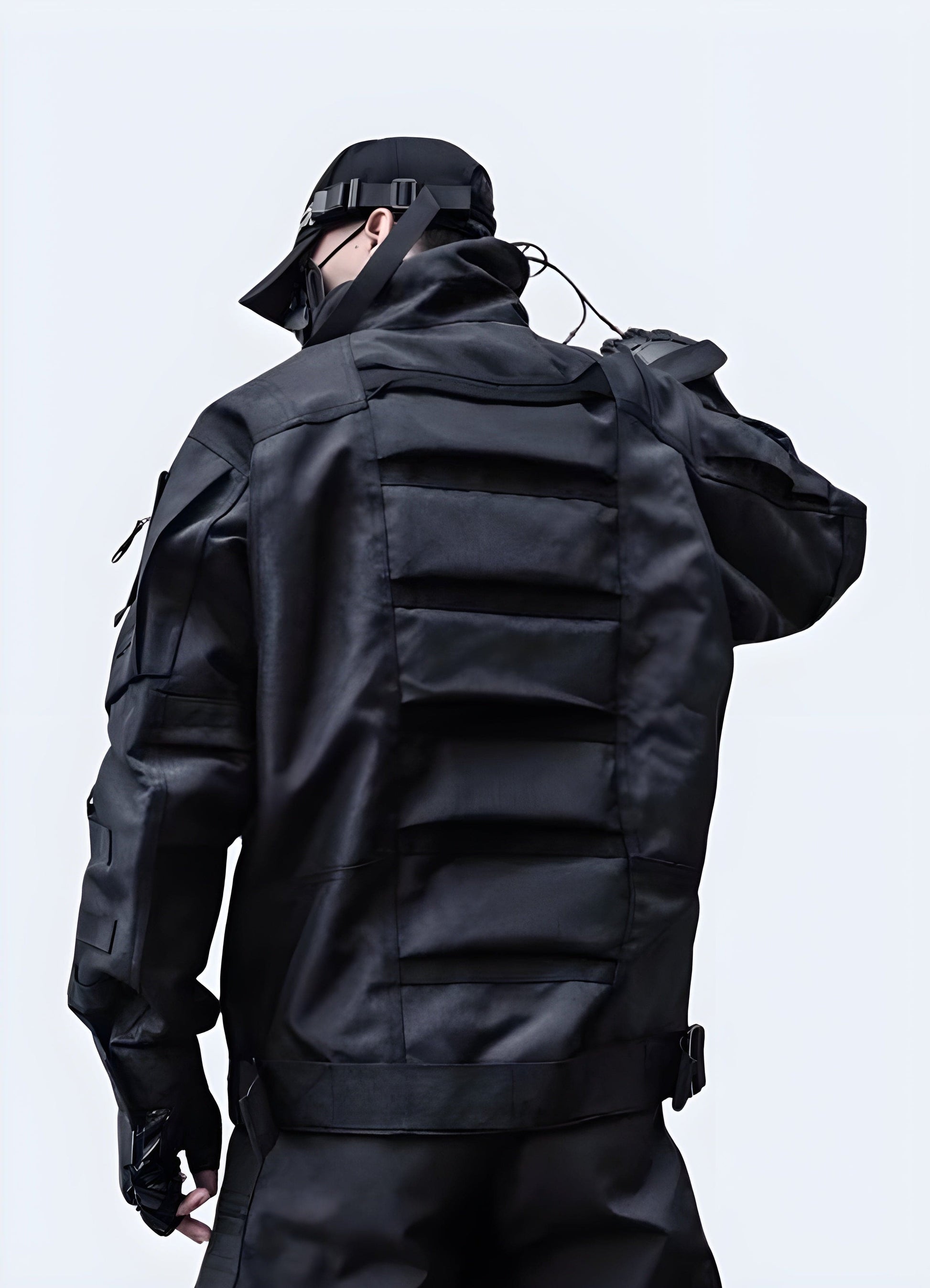  Back view of a tall man wearing a tactical bomber jacket, showcasing its sleek design and practical features, perfect for UK's urban fashion scene and outdoor adventures.