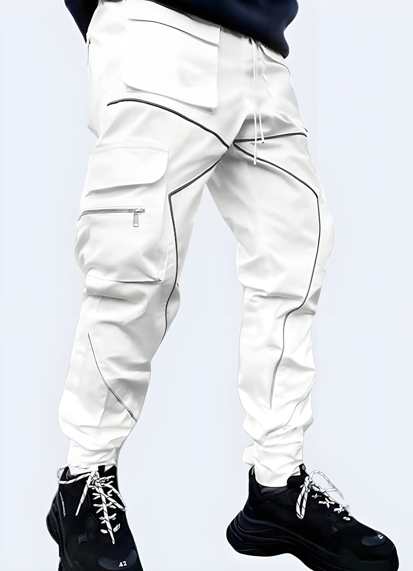 Man wearing white reflective pants in the UK, showcasing the practical and stylish design from a side view perspective, ideal for enhanced visibility and safety.